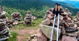 Nordic Walking poles resting on some stones